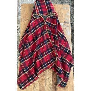 Red plaid hooded cape with wooden buttons.